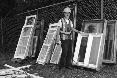 Construction site with builders waste containers in North West London