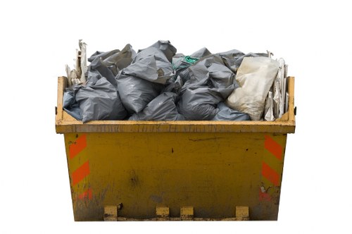 Waste collection trucks in Welsh Harp